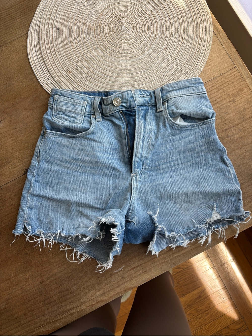 PAIGE Light Blue Distressed Denim Cutoff Shorts